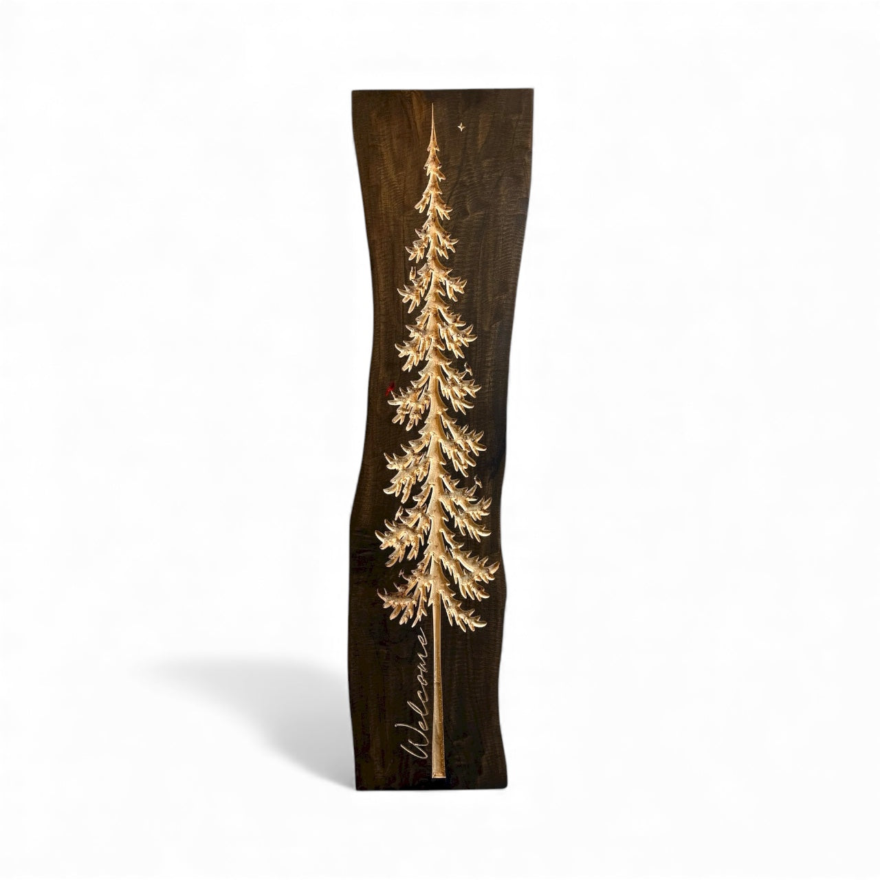 Handcrafted live edge wood wall art featuring a carved pine tree on dark stained wood, rustic vertical decor sign