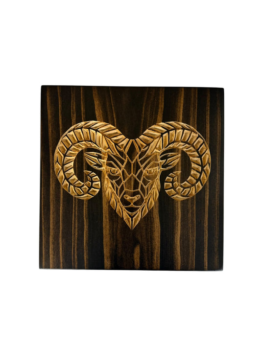 Geometric bighorn ram wall art carved into solid wood with Kona stain and natural wood ram design from the CARVEDN Timber Apex collection