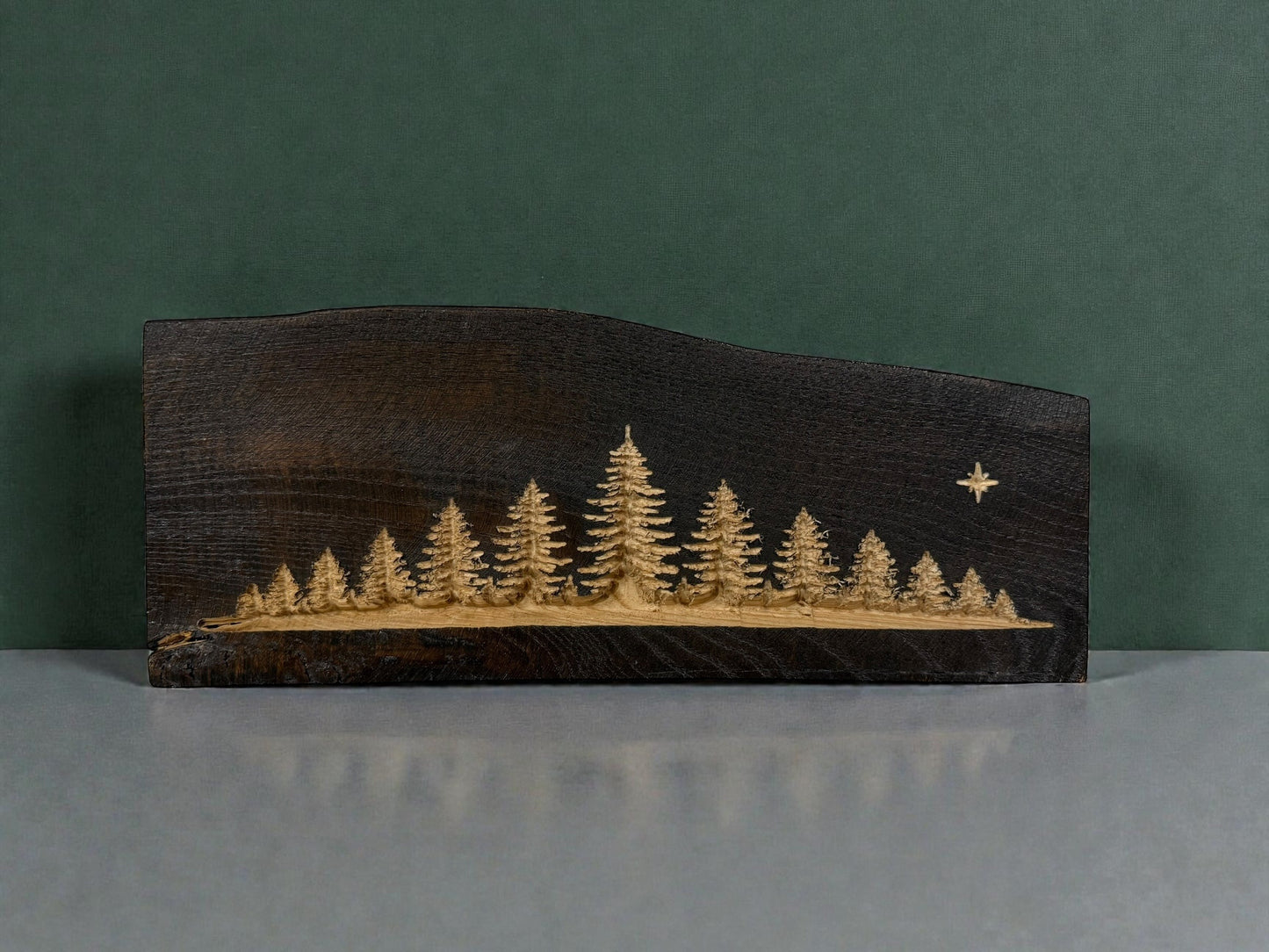 Midnight Pines live edge wood shelf art with carved forest trees by CARVEDN